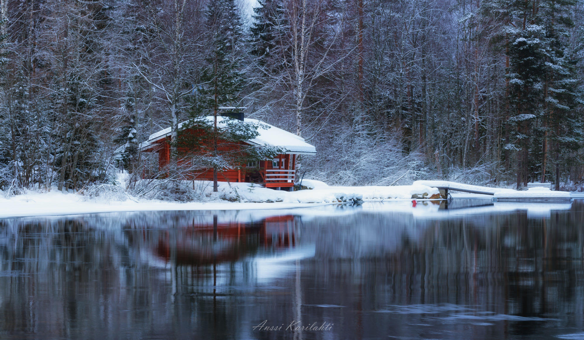 Red cabin in the snow
