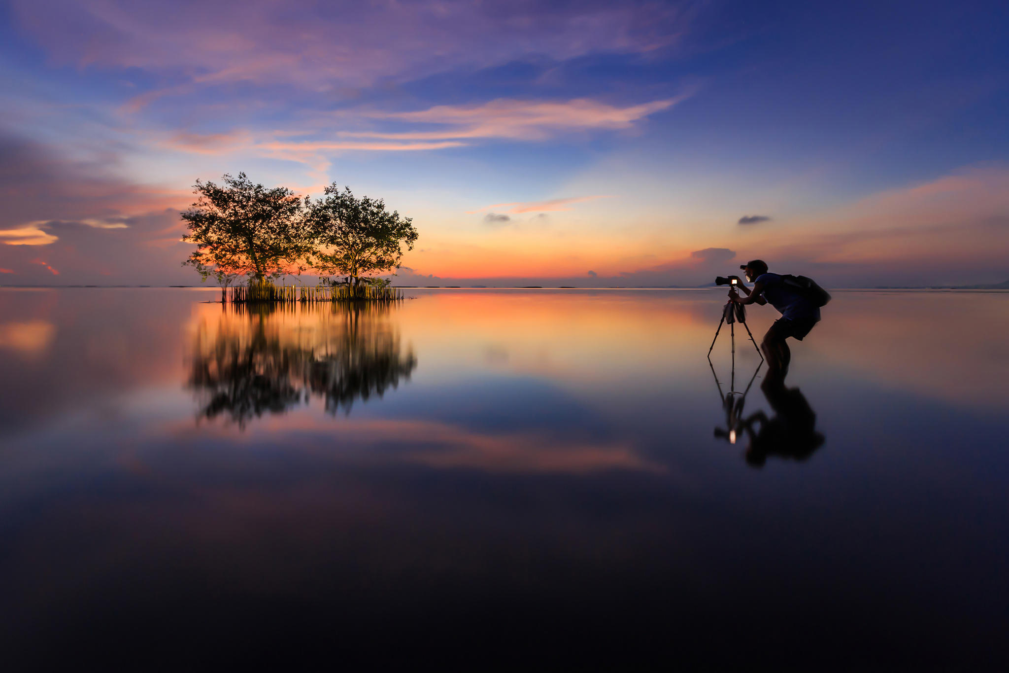 Photographer in lake