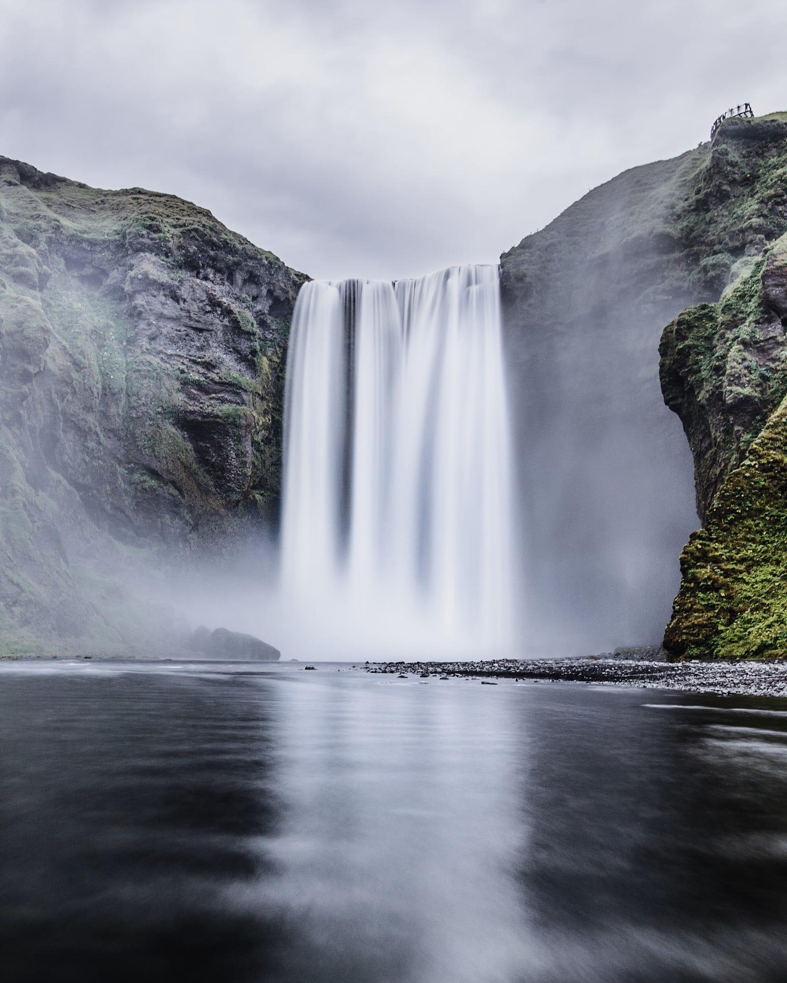 skogafoss. iceland. Sometimes you just have to stand in glacier water to get the shot.