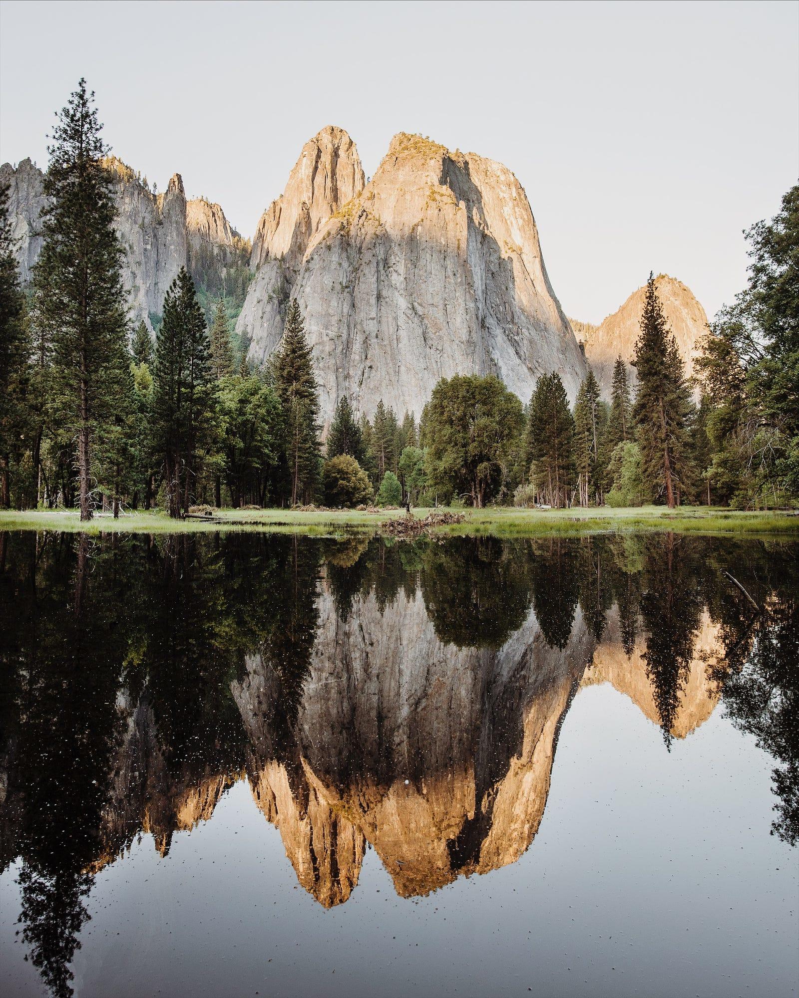 sunrise and spring flood. reflecting cathedral roc ...